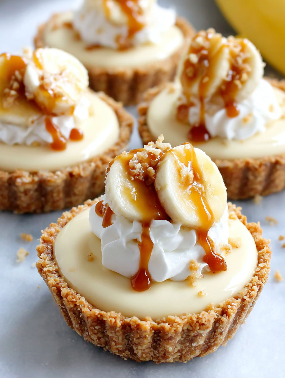 A dessert with bananas and whipped cream.