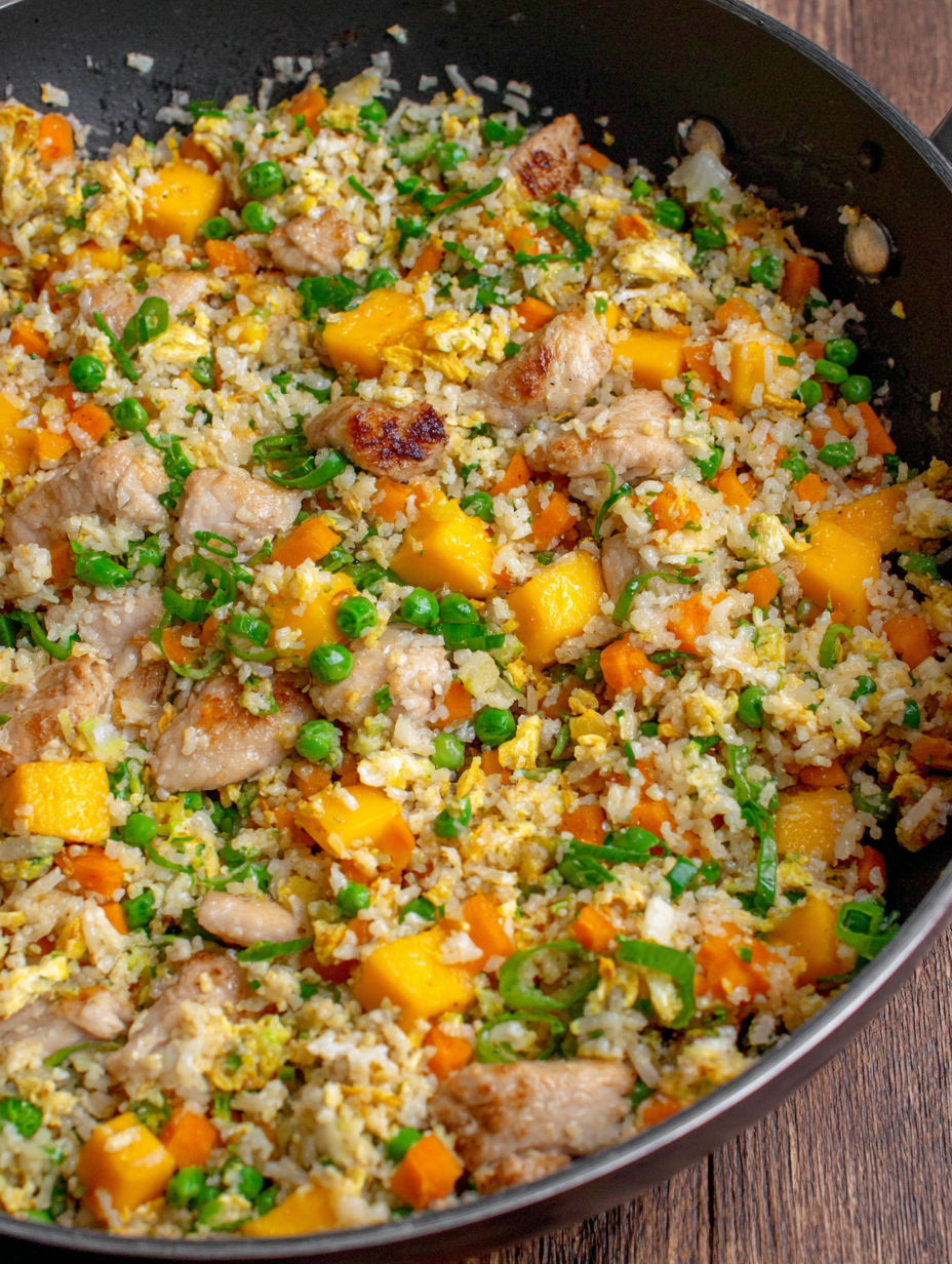 A bowl of rice and vegetables.