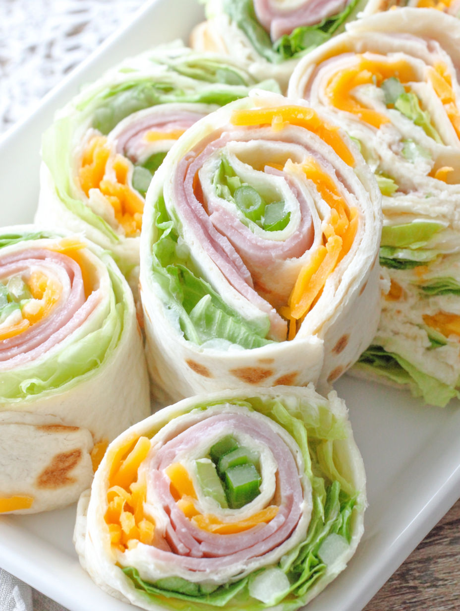 A plate of food with a sandwich and a salad.