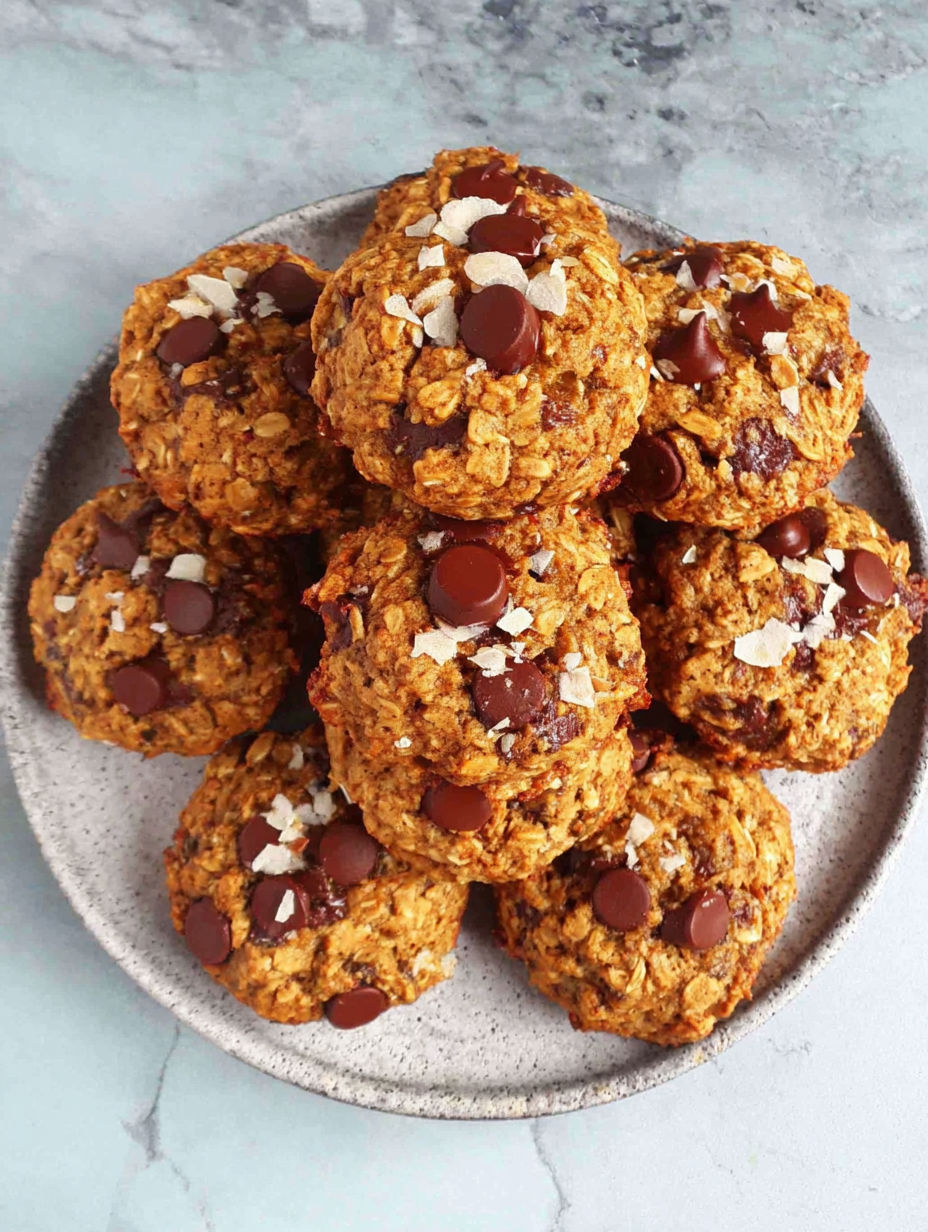 A plate of gluten-free oatmeal chocolate chip cookies.