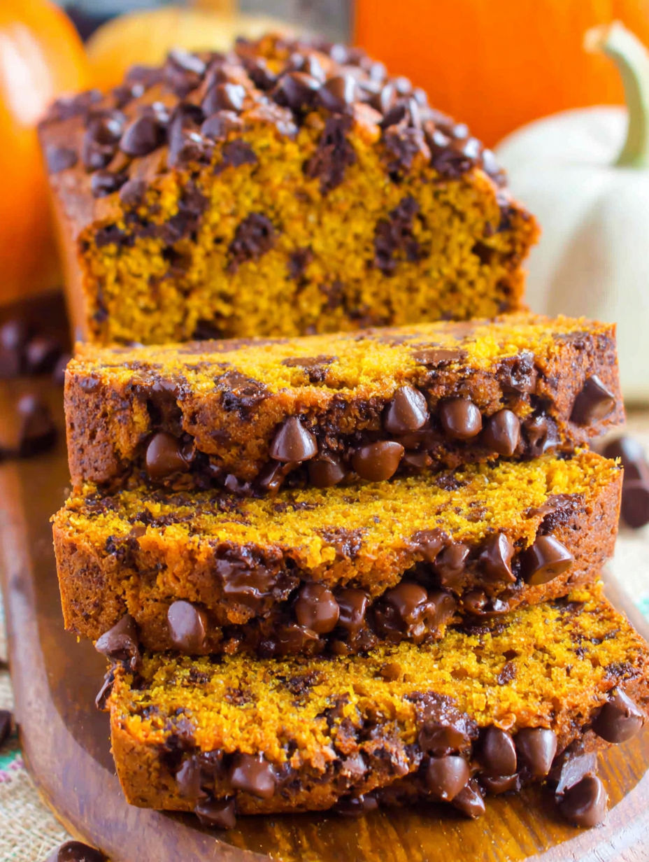 A slice of pumpkin bread with chocolate chips.