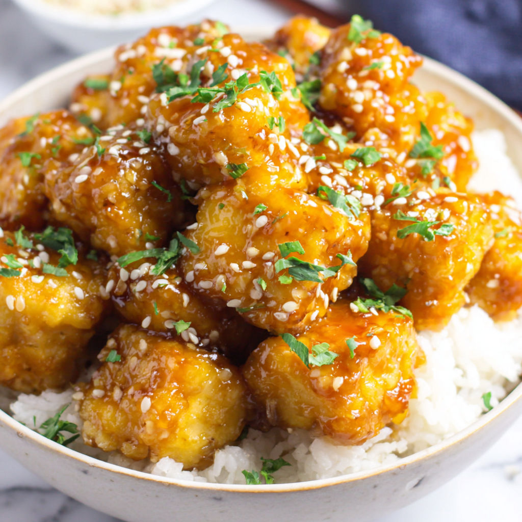 A bowl of crispy honey garlic tofu.