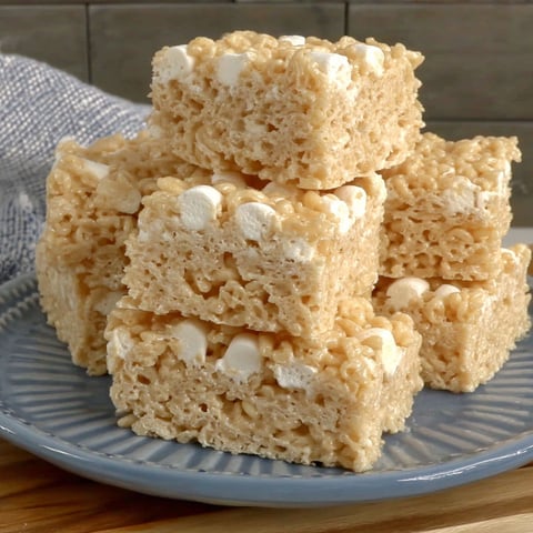 A plate of rice krispie treats.