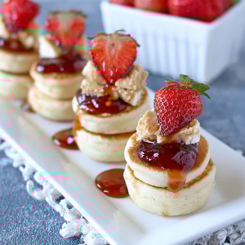 Peanut butter and jelly mini pancake stacks for school lunch.
