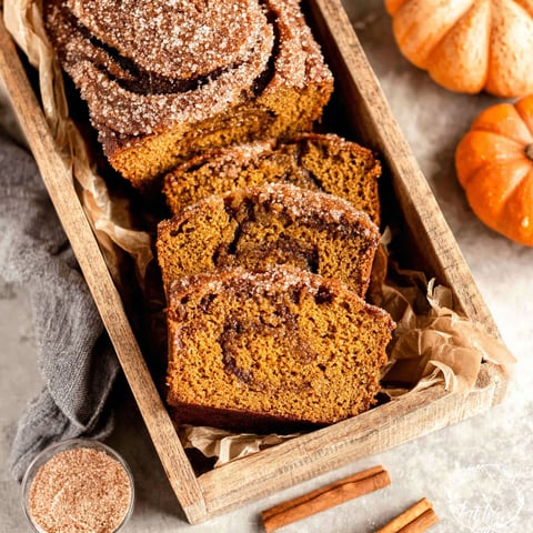 A box of cinnamon swirl pumpkin bread mini loaves.