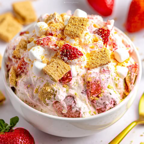 A bowl of strawberry cheesecake fluff salad.