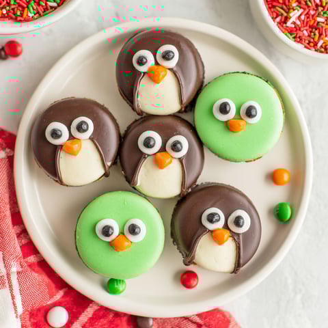 A plate of penguin cookies.