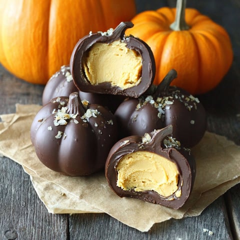 Chocolate peanut butter pumpkins on a table.