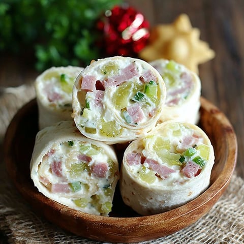 A plate of pickle dip roll-ups.