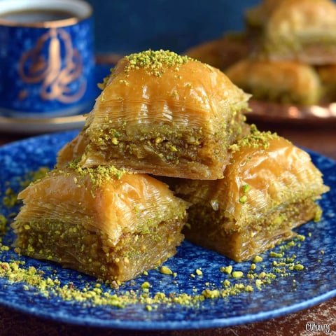 A plate of Baklava with Pistachios.