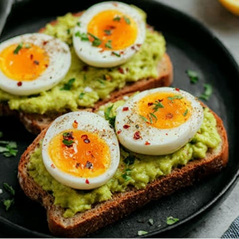 Toast with eggs and avocado.